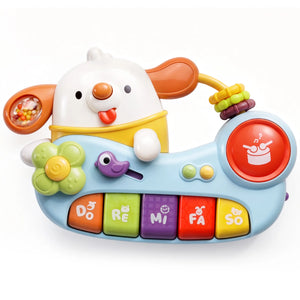 Colorful toy piano with cartoon character on a white background