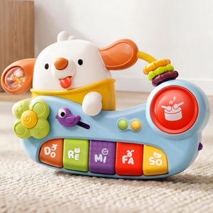 Colorful toy piano with cartoon dog design on a light background