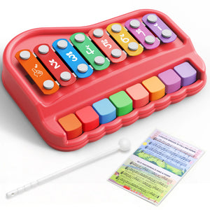 Colorful toy keyboard with keys and a music sheet on a white background